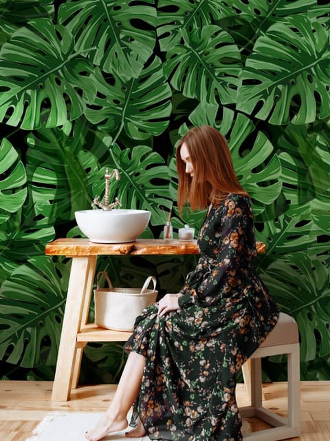 Papier peint à motifs de feuilles tropicales vertes