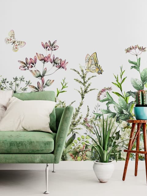 Papier peint panoramique de fleurs sauvages et de feuilles fraîches vertes