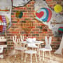 Hot Air Balloon with Young People on Brick Wallpaper Mural