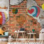 Hot Air Balloon with Young People on Brick Wallpaper Mural