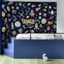 Kids Cartoon Space with Astronaut and Colorful Planets Wallpaper Mural